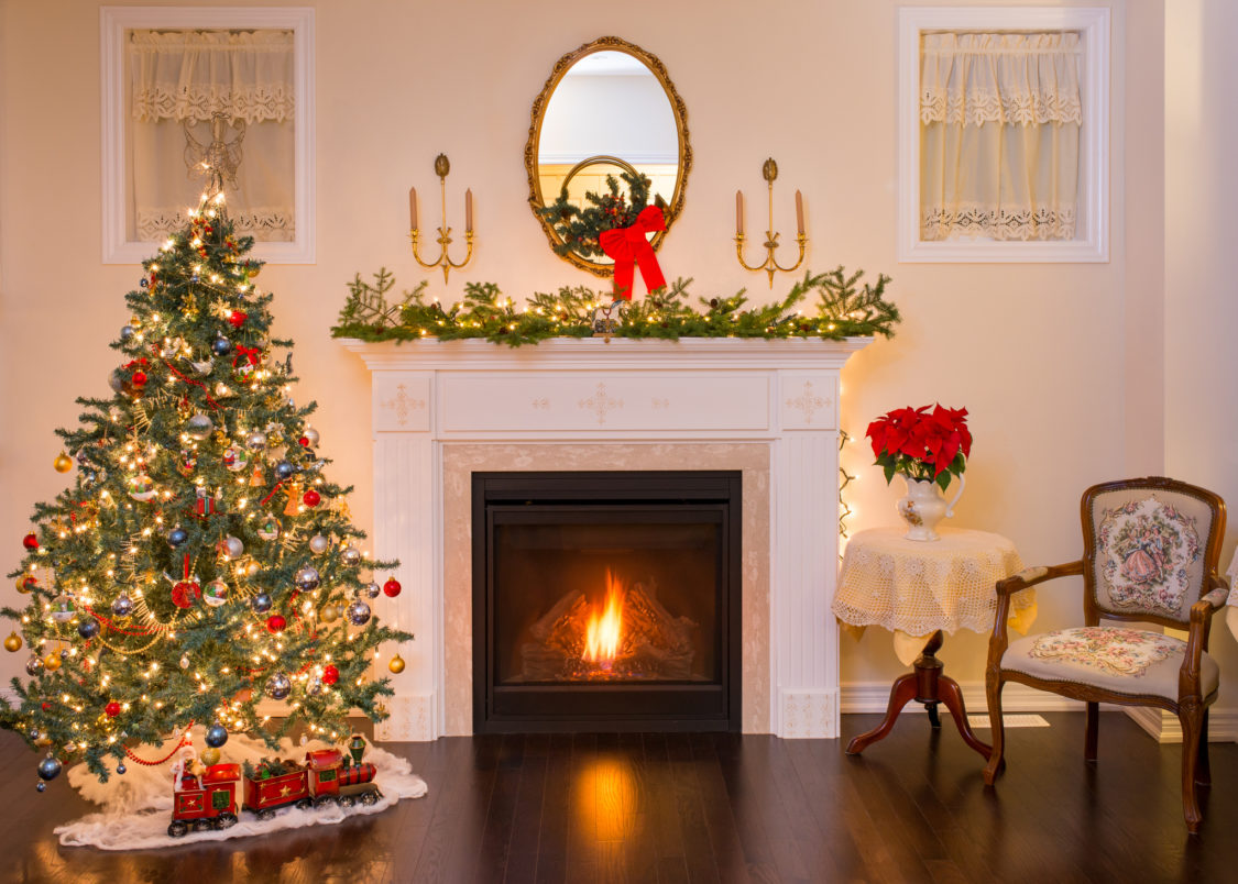 Family room fireplace with Christmas decorations