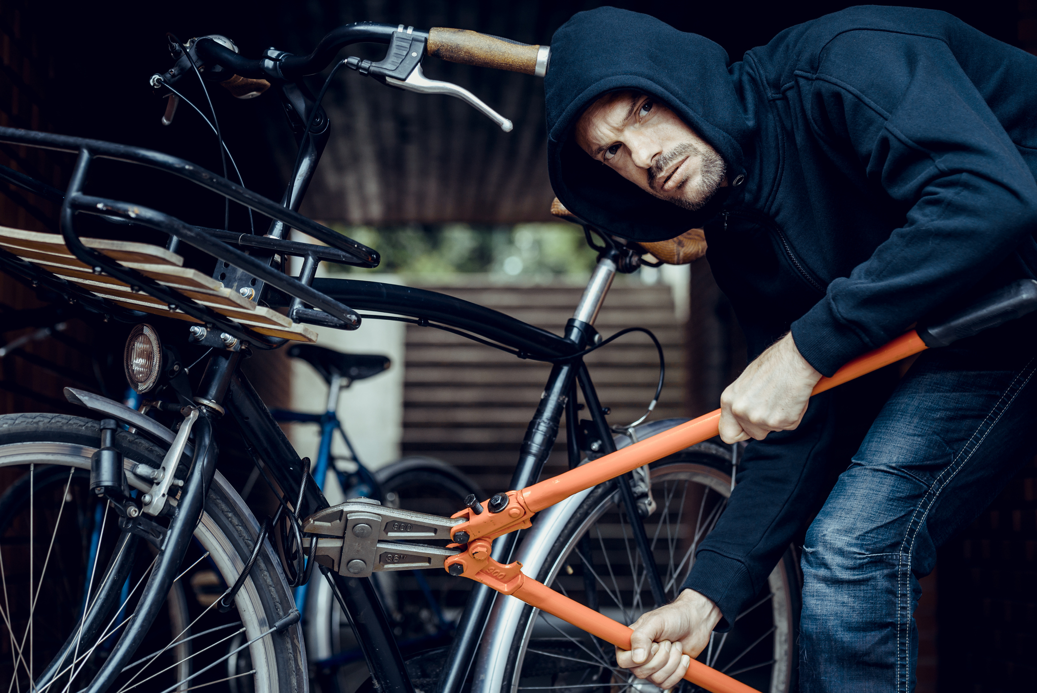Thief stealing a bicycle