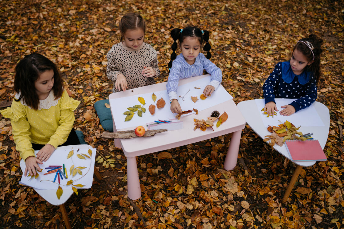 children being creative in the fall