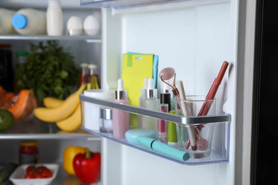 Storage of cosmetics and tools in refrigerator door bin next to groceries