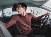 Male driver was backing up and hit another car in the parking lot. The concept of negative emotions and insurance in case of damage to the vehicle