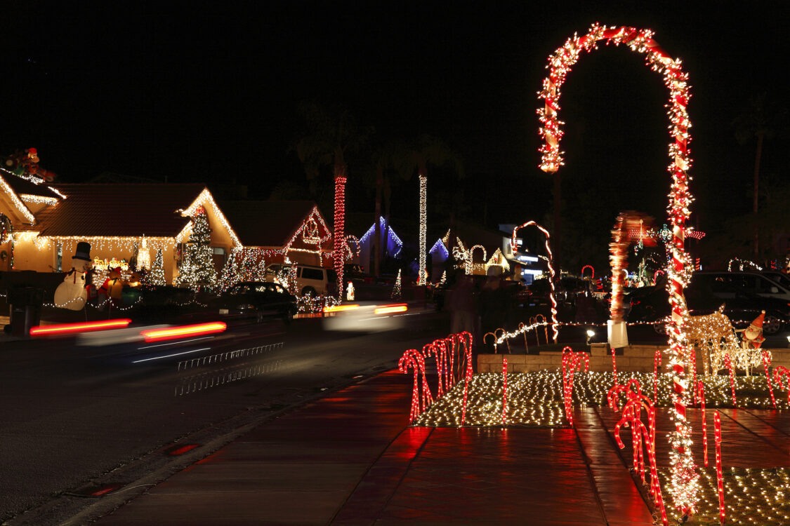 Entire residential street and houses decorated for Christmas. 