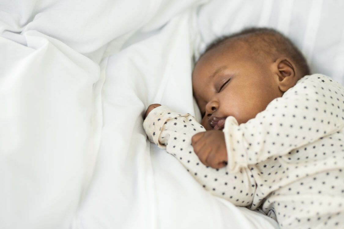 shot of a baby girl sleeping peacefully at home
